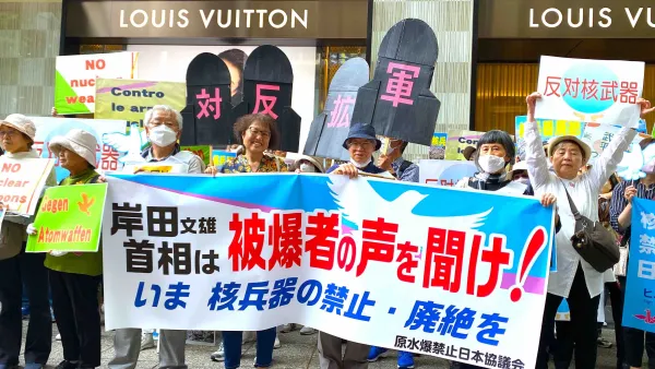 People holding sign at protest