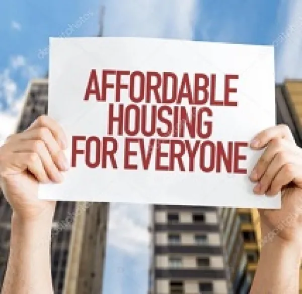 Drawing of two hands holding up a sign saying Affordable Housing for Everyone and a big building in the background
