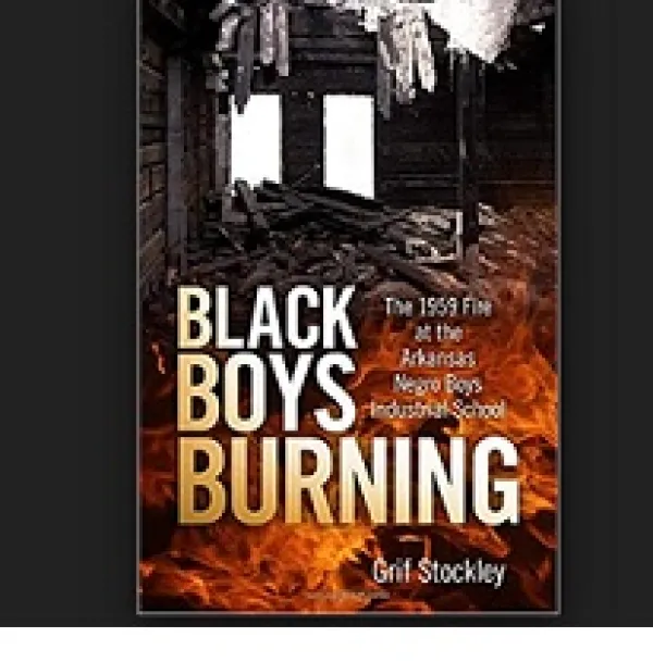 A wrecked up burning building book cover with words Black Boys Burning