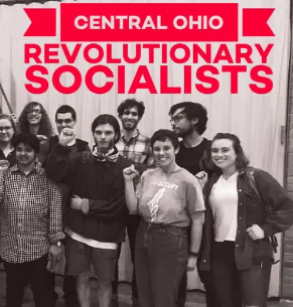 CORS people posing by their banner