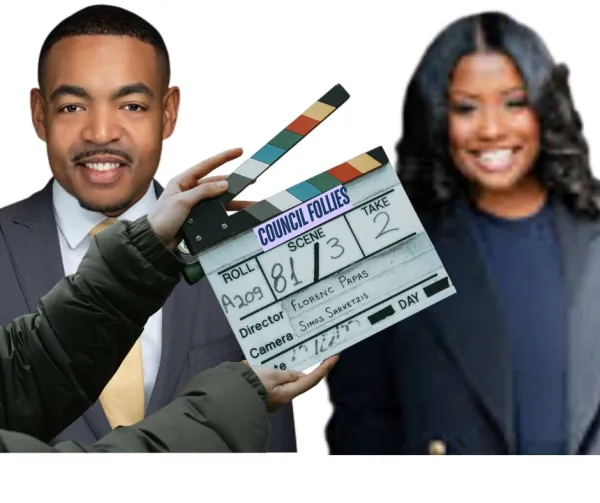 Shannon Hardin and Tiara Ross with movie clapboard