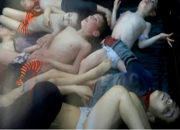 Kids lying on ground looking like they are dead