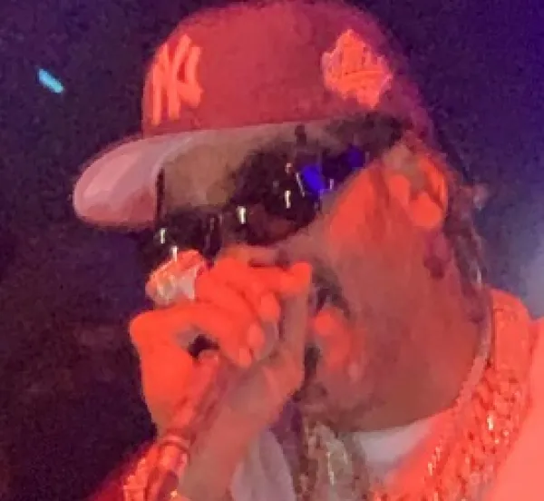 Man singing into mic