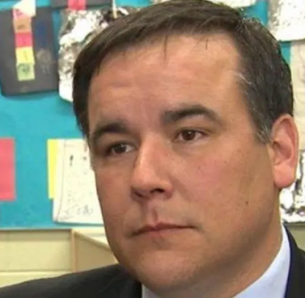 Middle aged white ma's face looking vacant