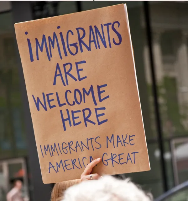 Sign saying Immigrants are welcome here