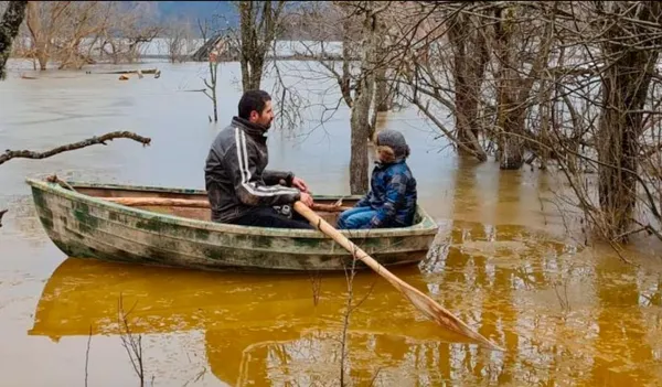 Two people in a rowboat