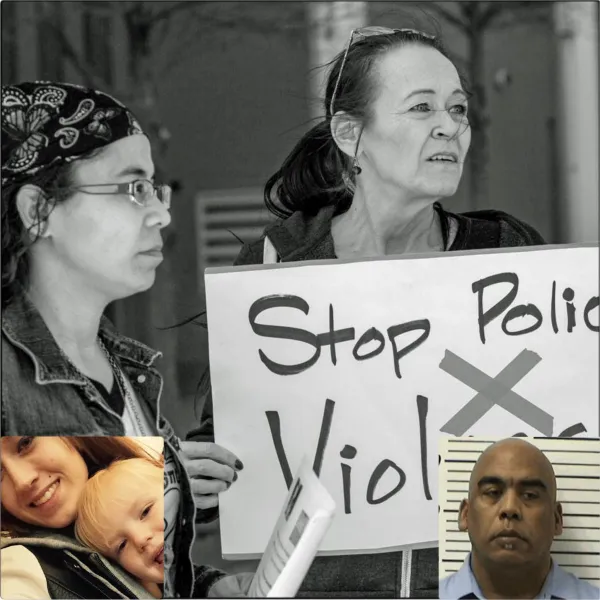 People holding sign, Andrew Mitchell and Donna Dalton