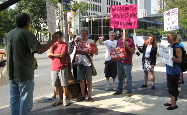 People holding signs