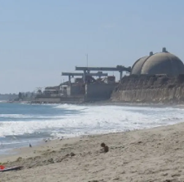 Round topped nuclear plant right on the beach with water coming in