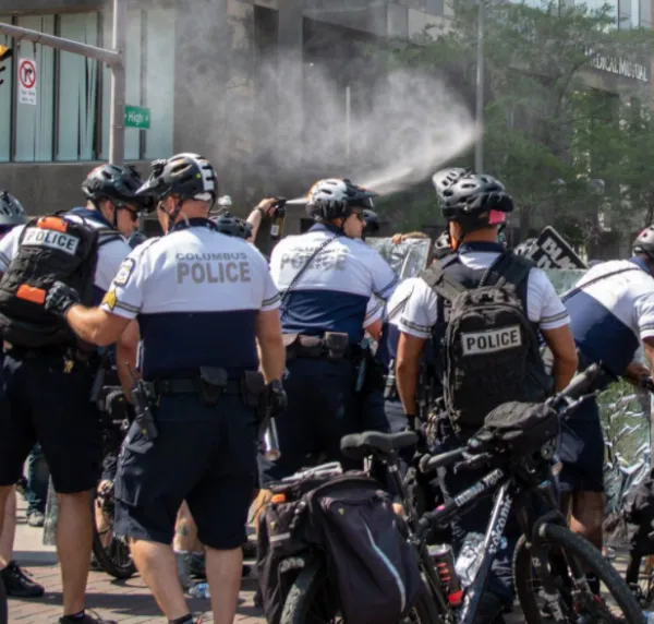 Cops spraying at a protest