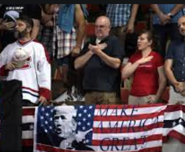Protestors with MAGA flag
