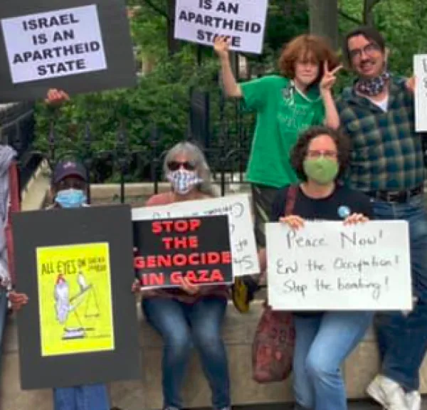 People with signs protesting