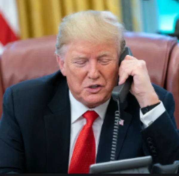 Trump at his desk on the phone