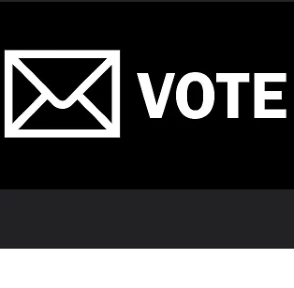 Word "Vote"" by an envelope