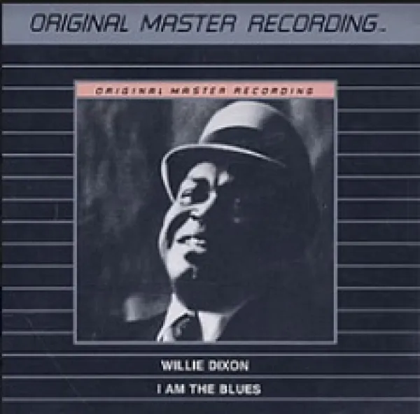 Black album cover with gray thin stripes in the middle there's a black man's face with a bowler hat on at the top it says Original Master Recording then below it says Willie Dixon, I am the Blues