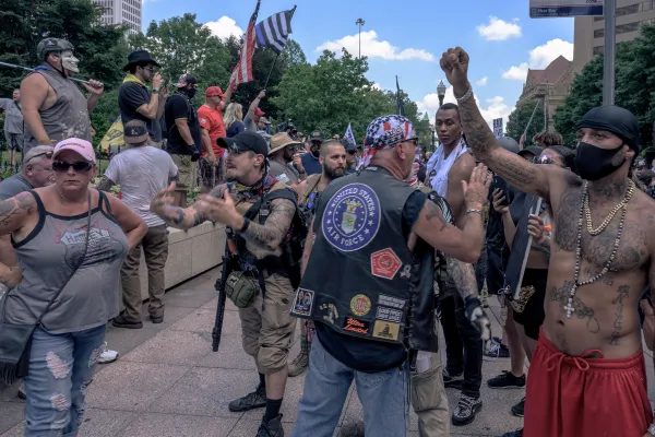 Lots of people at rally arguing