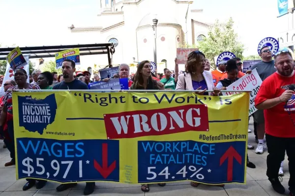 People holding banner