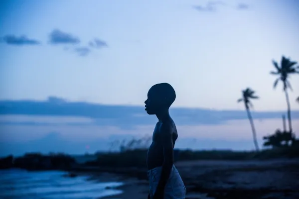 Boy standing on beach